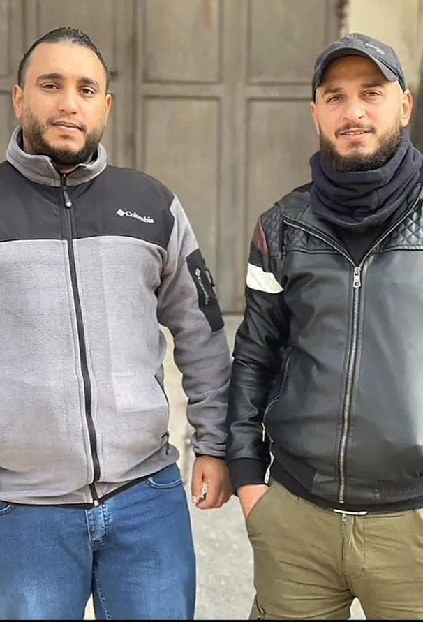 صورة عمار ورسمي الشهيد